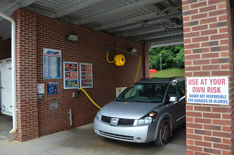 self-serve carwash, dryer, bay, car, signage, drying